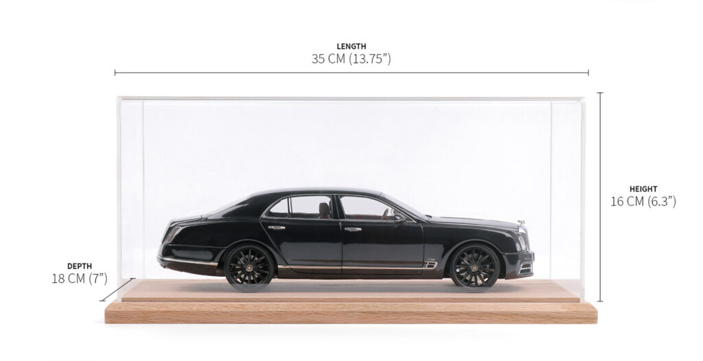 Black Bentley sedan model car in a tabletop display case