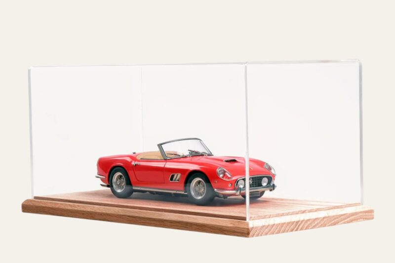 Oak tabletop display case with a red Ferrari California model car