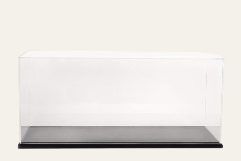Empty black tabletop display case with a clear acrylic cover